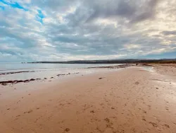 Click to view image Studland beach at low tide